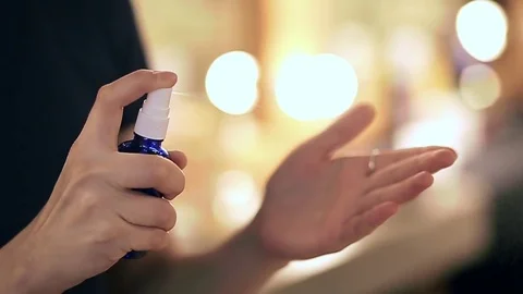 Makeup artist cleans hands with peroxide before starting work, close up in slow Stock Footage 76080982