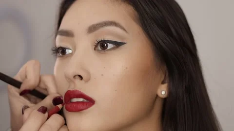 Makeup Artist Complete Make-up for Asian Woman Stock Footage 133188989