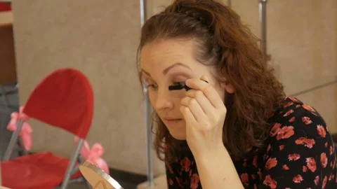 Makeup artist conducts a master class for young girl. Stock Footage 72622553