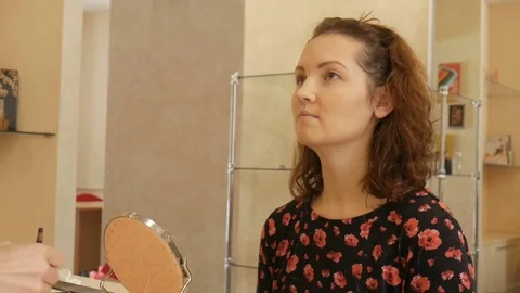 Makeup artist conducts a master class for young girl. Stock Footage 72622616