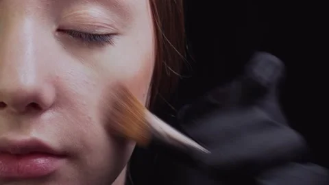 Makeup artist does makeup to client. Stock Footage 156806066