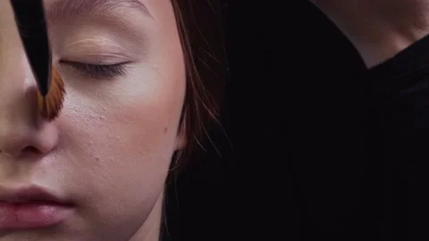 Makeup artist does makeup to client. Stock Footage 164665293