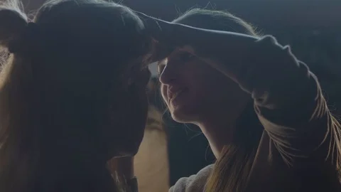 Makeup artist doing make up face to young woman in beauty studio Stock Footage 91063696