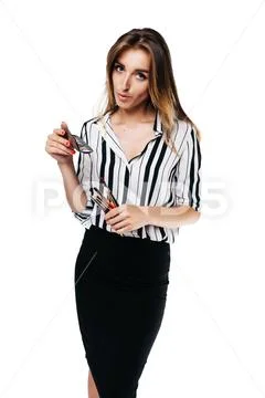 Makeup artist girl on a white background with brushes Stock Photos