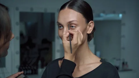 Makeup artist make eyebrows Stock Footage 111368074