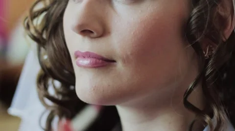 The Makeup Artist Makes up Lips to The Bride. Stock-Footage 52490951
