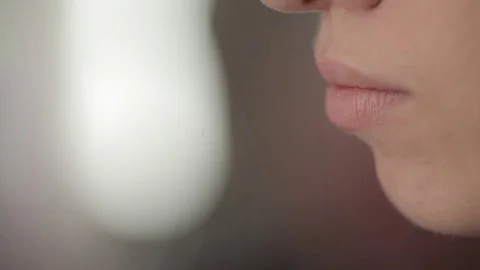 Makeup artist makes models lips makeup Stock Footage 83385501