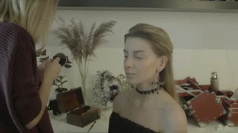 Makeup artist makes young beautiful bride bridal makeup Stock Footage 67961834