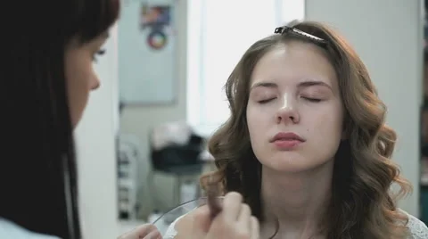 Makeup artist making make-up for the stylish bride Stock Footage 66003610