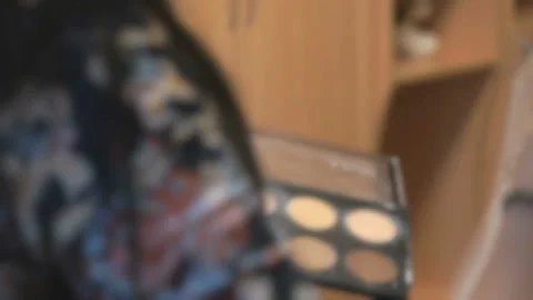 Makeup artist making make-up for stylish model Stock Footage 87529444