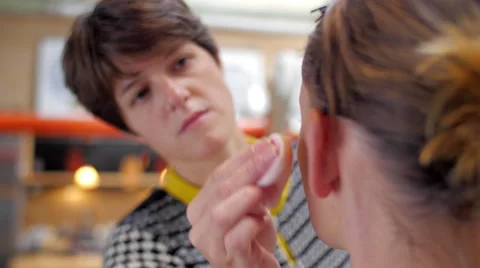 Makeup artist making up model closeup Stock Footage 59728753