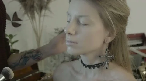 Makeup artist preparing bride before the wedding in a morning Stock Footage 67959366