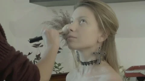 Makeup artist preparing bride before the wedding in a morning Stock Footage 67960760