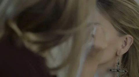 Makeup artist preparing bride before the wedding in a morning Stock Footage 67961190
