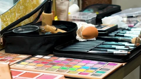 Makeup Artist Preparing Cosmetic Kit on Work Table Видео 325528852
