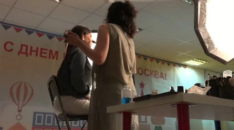 Makeup artist in the process of working with a model. Stock Footage 64654990