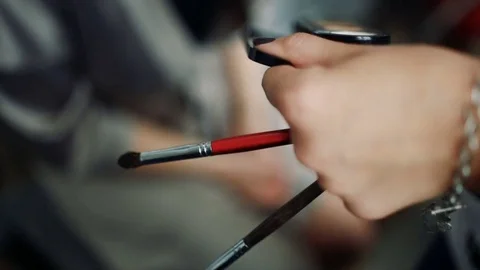 Makeup artist at work.Bride's make-up. Stock Footage 84804646