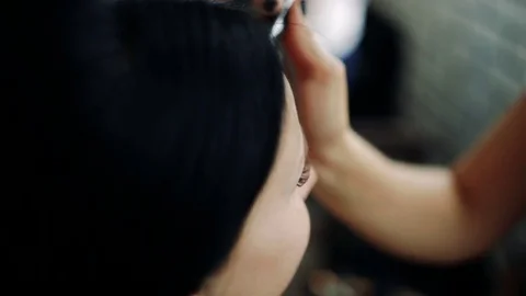 Makeup artist at work.Bride's make-up. Stock Footage 84804826