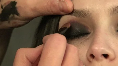 Makeup artist working with the eyes. Stock Footage 64382328