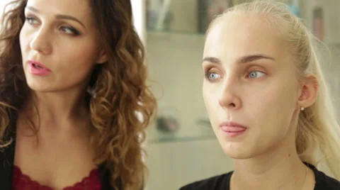 Makeup artist works on a model Stock Footage 68015123