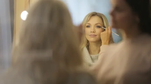 Makeup beautiful girl Stock Footage 104242426