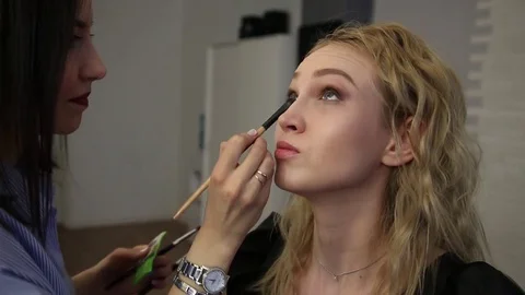 Makeup of beautiful model Stock Footage 73837208