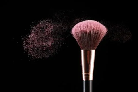 Makeup brush and dust. Stock Photos