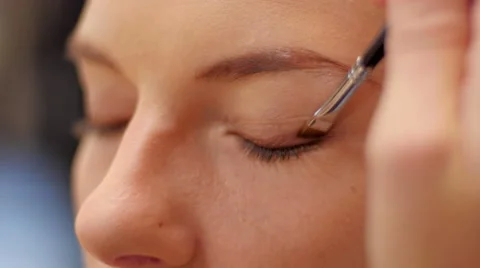 Makeup brush on eye close up Stock-Footage 59730404