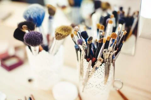Makeup Brush in Glass Beaker on Dressing Table. Stock Photos