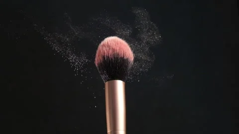 Makeup brush with a highlighter Stock Footage 151897404