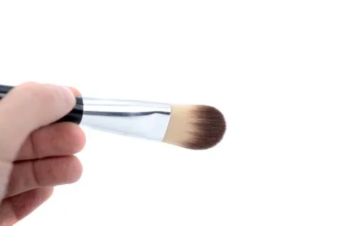 Makeup brush isolated on white background. Stock Photos