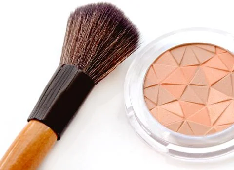 Makeup brush with pink blush Stock Photos