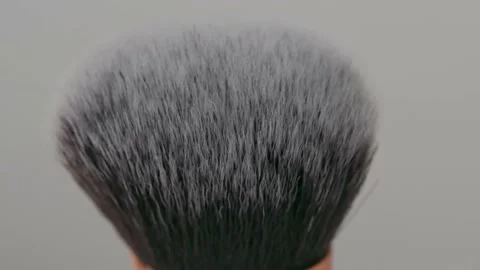 Makeup brush rotation on white background close up Stock Footage 231791479