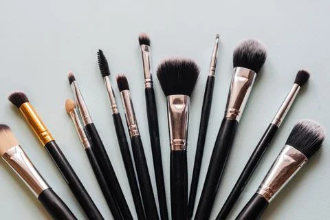 Makeup brush set light background. the view from the top. Stock Photos