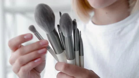 Makeup brush set visage female artist hands tools Stock Footage 157533983