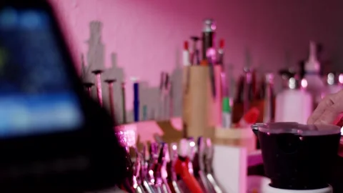 Makeup Brushes and Cosmetics on Beauty Table, Pink Neon Light, Close Up Stock Footage 341522109