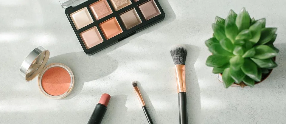 Makeup brushes and cosmetics on light background. Beauty, fashion concept. .. 写真素材
