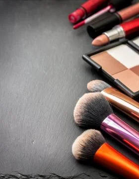 Makeup brushes and cosmetics Stock Photos