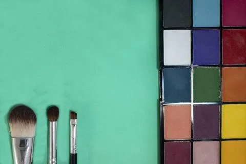 Makeup Brushes and Makeup Eyeshadow. Colorful Beauty Background, Creative A.. Stock Photos