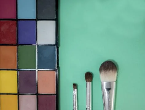 Makeup Brushes and Makeup Eyeshadow. Composition with Makeup Brushes and Mu.. Stock Photos