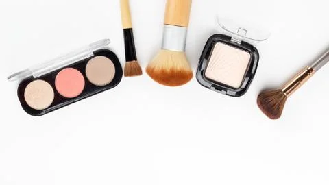 Makeup brushes and makeup powder Stock Photos
