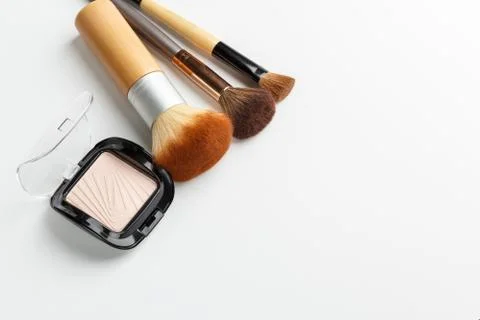 Makeup brushes and makeup powder Stock Photos