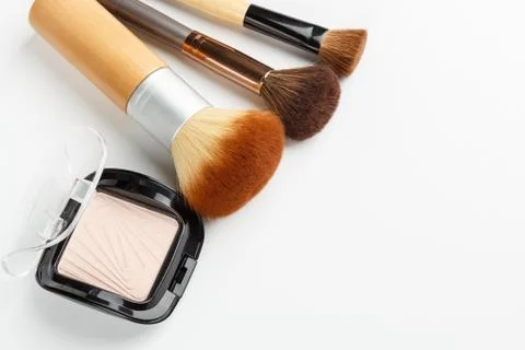 Makeup brushes and makeup powder Stock Photos