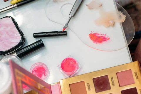 Makeup brushes are in a drawer at the makeup artist's workplace. close-up Stock Photos