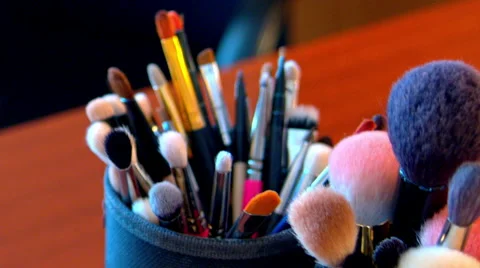 Makeup brushes are on the table Stock-Footage 65212735
