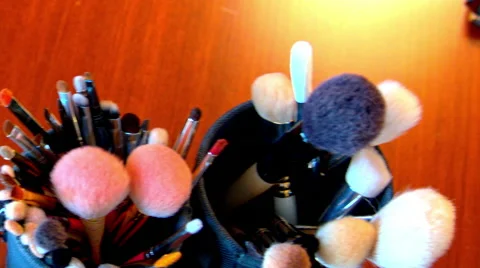Makeup brushes are on the table Stock Footage 65212921