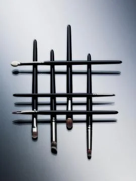 Makeup brushes arranged in pattern Foto stock