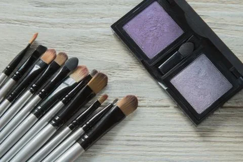 Makeup brushes on background Stock Photos