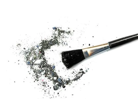 Makeup brushes with blusher and eyeshadow sample on white background Stock Photos