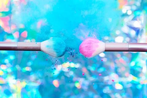 Makeup Brushes with Exploding Powder Stock Photos